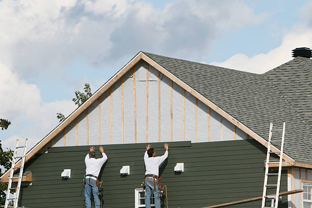 Professional Siding technician working in Falmouth, VA